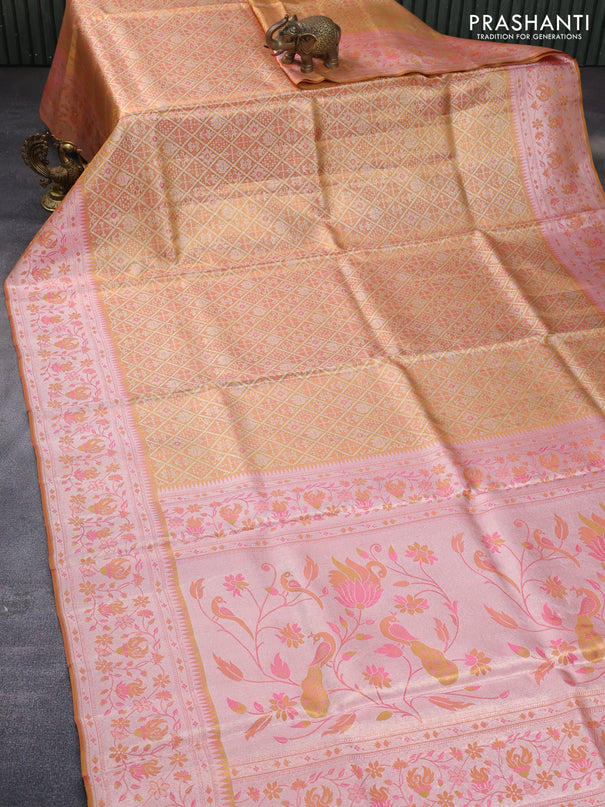 Pure kanchipuram tissue silk saree gold and mild peach pink with allover zari woven brocade weaves and rich temple design zari woven border