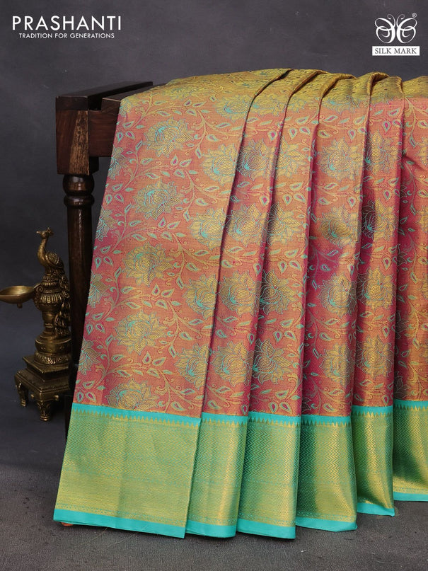 Pure kanchipuram tissue silk saree dual shade of goldish pink and teal blue with allover zari woven floral brocade weaves and zari woven border