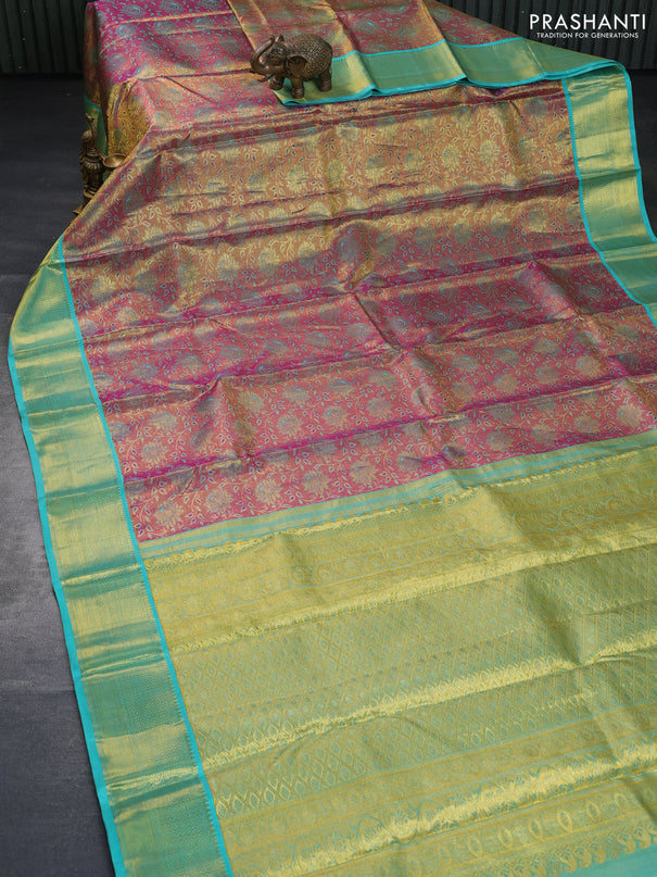 Pure kanchipuram tissue silk saree dual shade of goldish pink and teal blue with allover zari woven floral brocade weaves and zari woven border