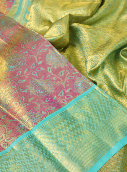 Pure kanchipuram tissue silk saree dual shade of goldish pink and teal blue with allover zari woven floral brocade weaves and zari woven border