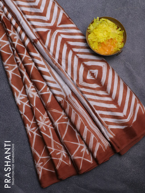 Modal silk saree rust shade with allover prints and printed border