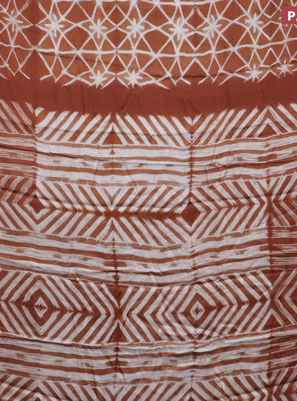 Modal silk saree rust shade with allover prints and printed border