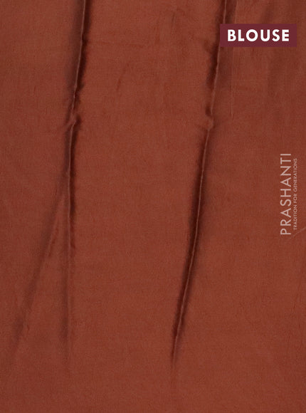 Modal silk saree rust shade with allover prints and printed border