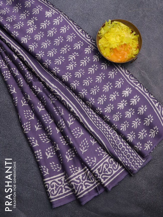 Modal silk saree lavender shade with butta prints and printed border