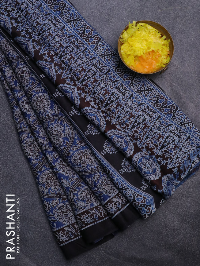 Modal silk saree blue and black with allover kalamkari prints and printed border