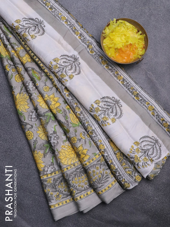 Modal silk saree grey shade with allover kalamkari prints and printed border