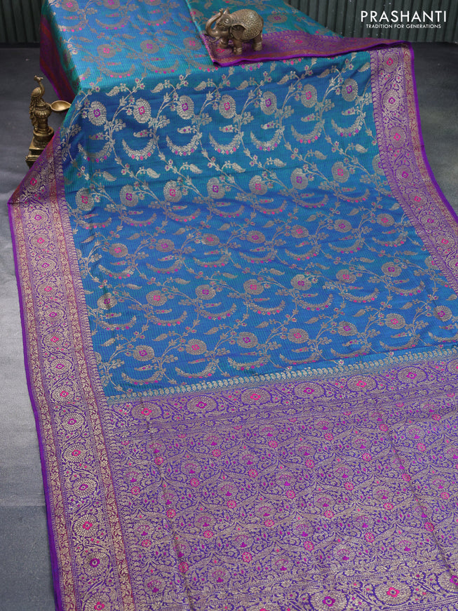 Banarasi dupion silk saree dual shade of bluish green and purple with thread & zari woven floral borcade weaves and woven border