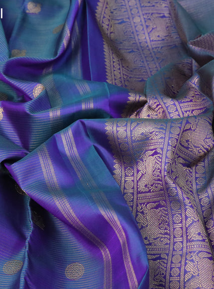 Pure kanchipuram silk saree dual shade of bluish green with allover zari weaves & annam buttas and zari woven border