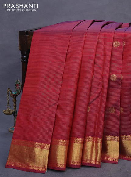 Pure kanchipuram silk saree dual shade of maroon with allover zari weaves & annam buttas and zari woven border