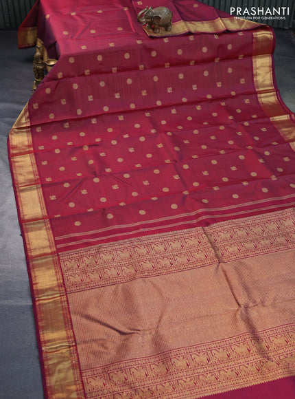 Pure kanchipuram silk saree dual shade of maroon with allover zari weaves & annam buttas and zari woven border