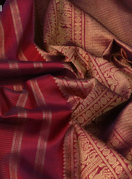 Pure kanchipuram silk saree dual shade of maroon with allover zari weaves & annam buttas and zari woven border