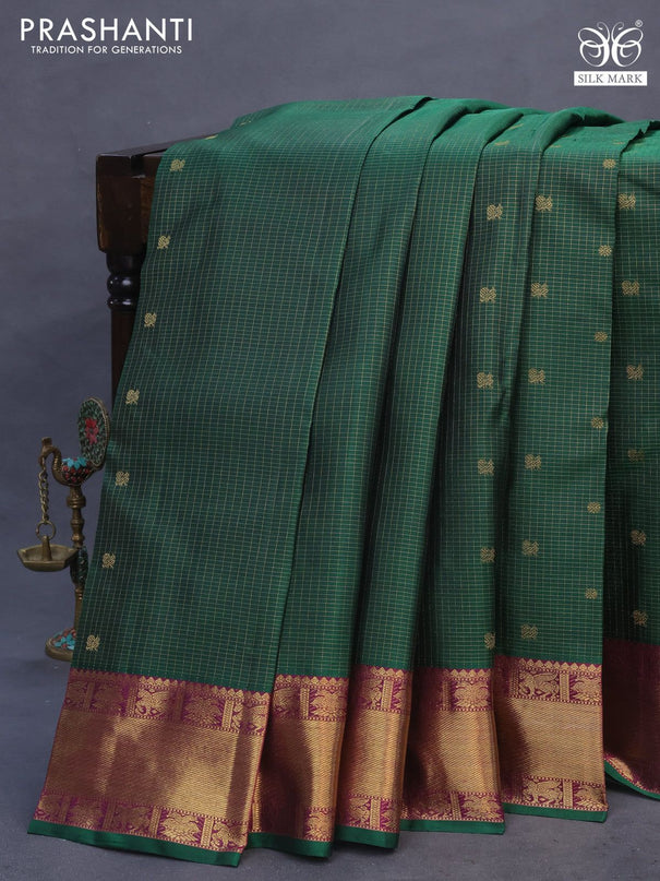 Pure kanchipuram silk saree dark green and purple with allover small zari checks & annam buttas and zari woven border