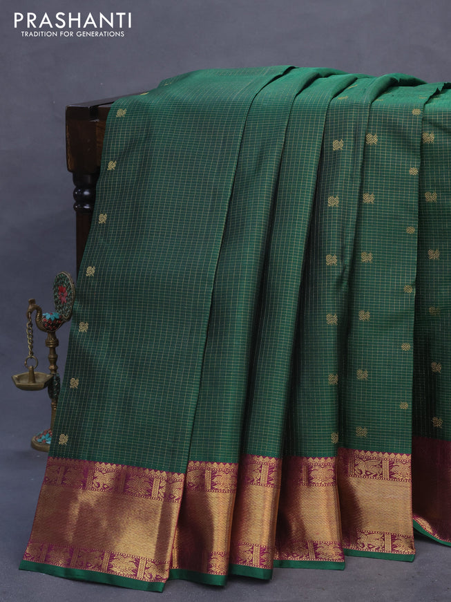 Pure kanchipuram silk saree dark green and purple with allover small zari checks & annam buttas and zari woven border