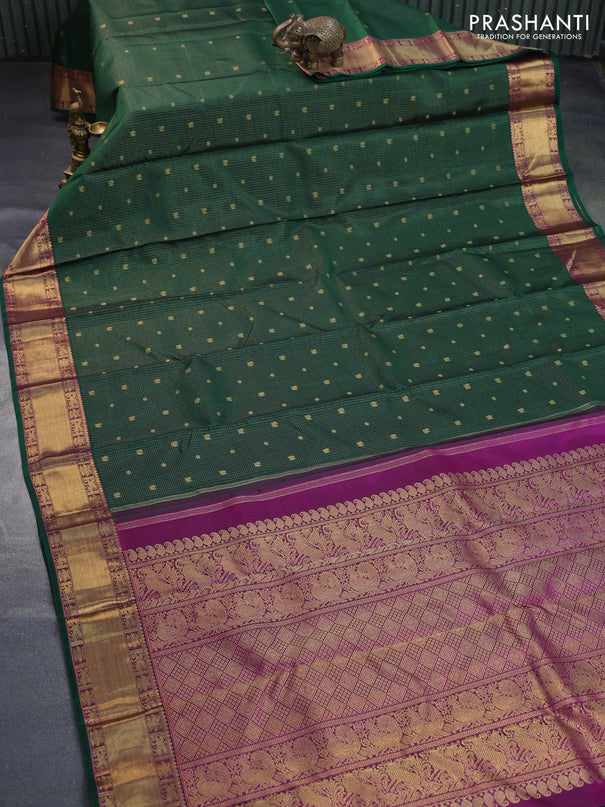 Pure kanchipuram silk saree dark green and purple with allover small zari checks & annam buttas and zari woven border