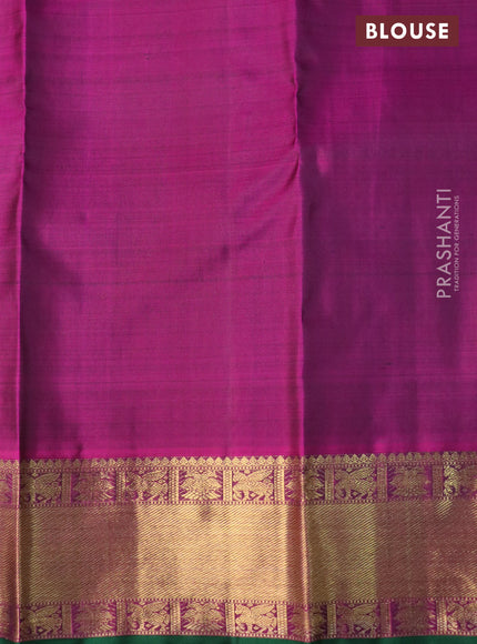 Pure kanchipuram silk saree dark green and purple with allover small zari checks & annam buttas and zari woven border