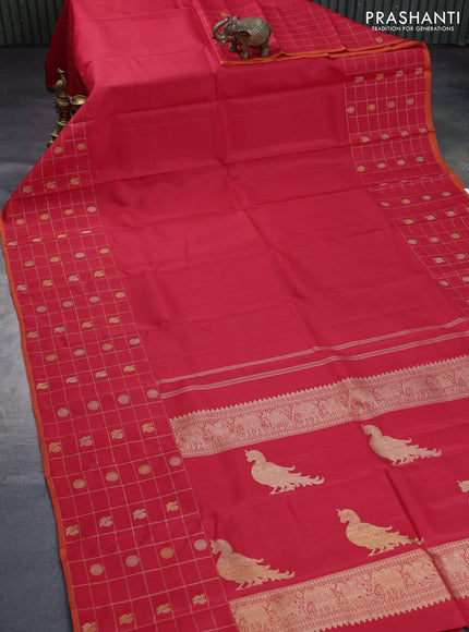 Pure kanchipuram silk saree red and orange with plain body and long zari checked butta border