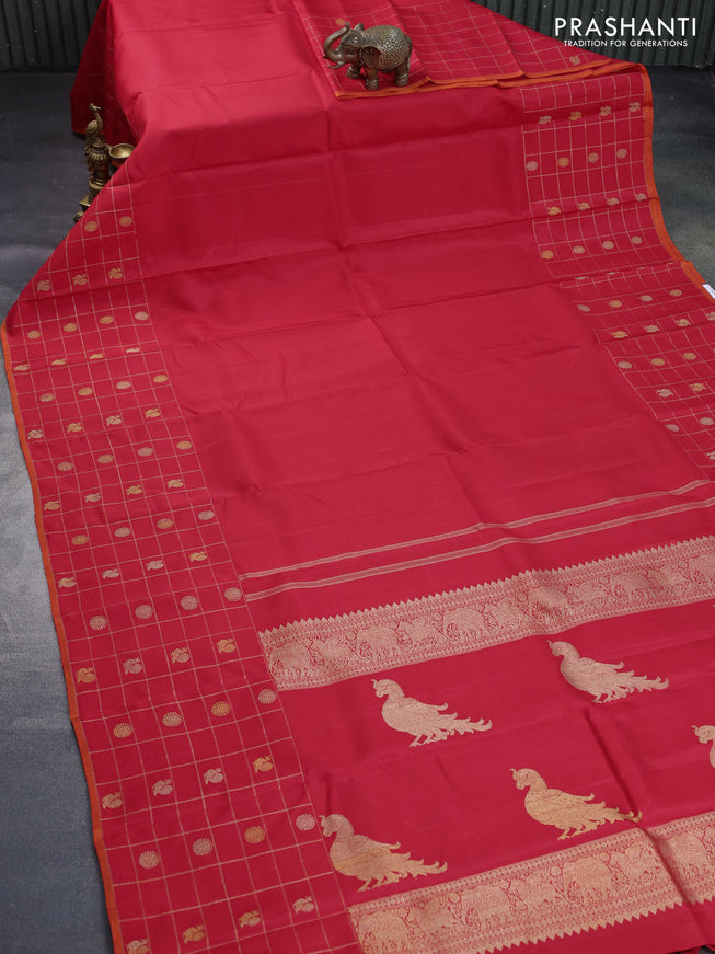 Pure kanchipuram silk saree red and orange with plain body and long zari checked butta border