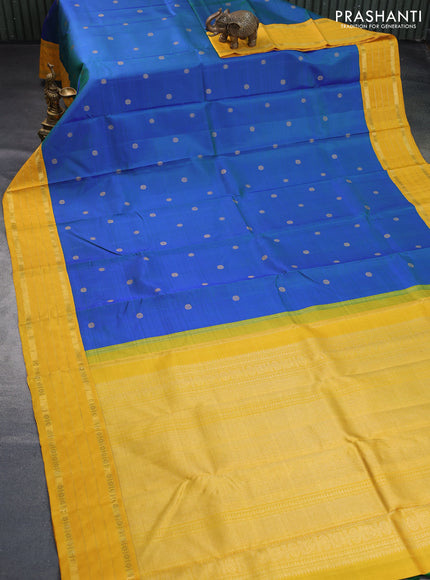 Pure kanchipuram silk saree dual shade of bluish green and yellow with zari woven buttas and rich zari woven korvai border