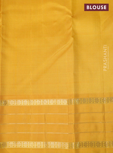 Pure kanchipuram silk saree dual shade of bluish green and yellow with zari woven buttas and rich zari woven korvai border