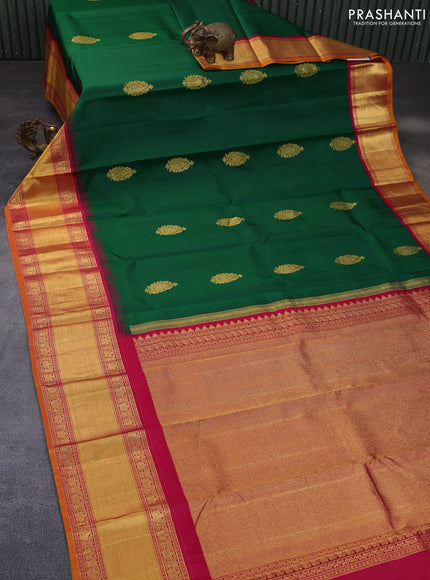 Pure kanchipuram silk saree green and magenta pink with zari woven buttas and temple design lomg rich zari woven border