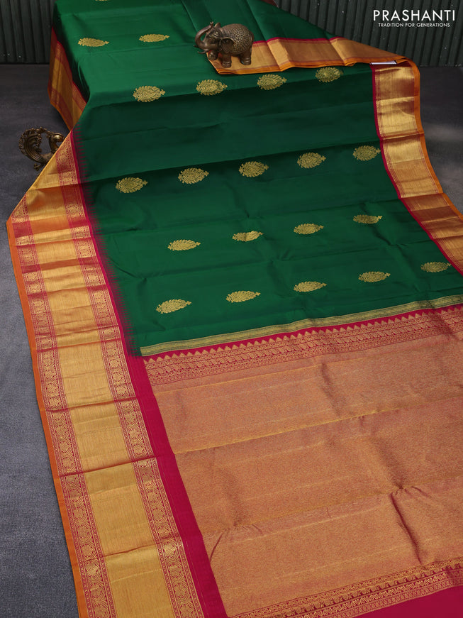 Pure kanchipuram silk saree green and magenta pink with zari woven buttas and temple design lomg rich zari woven border