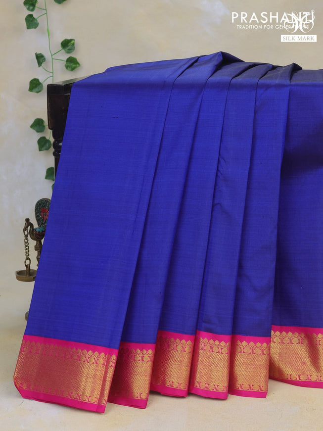 Pure kanchipuram silk saree blue and pink with plain body and zari woven korvai border