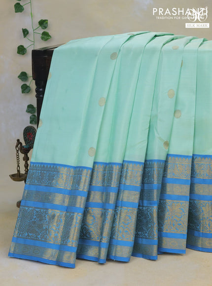 Pure kanchipuram silk saree teal shade and cs blue with rudhraksha zari woven buttas and long rich zari woven border