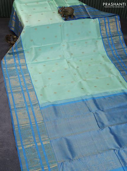 Pure kanchipuram silk saree teal shade and cs blue with rudhraksha zari woven buttas and long rich zari woven border