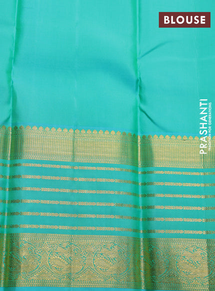 Pure kanchipuram silk saree cream and teal blue with annam zari woven buttas and long rich zari woven korvai border