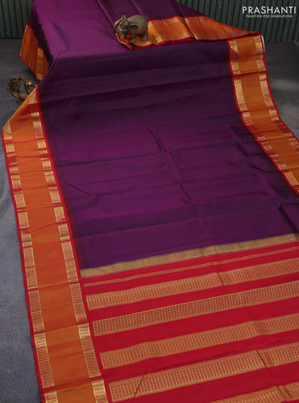 Pure kanchipuram silk saree wine shade and red with plain body and temple design rettapet zari woven border