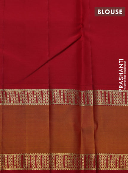 Pure kanchipuram silk saree wine shade and red with plain body and temple design rettapet zari woven border