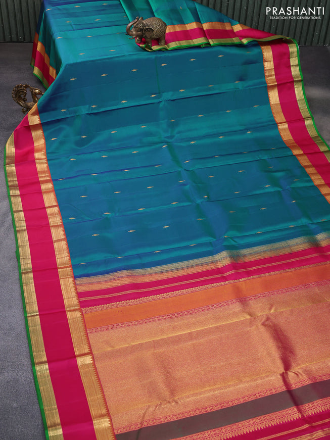 Pure kanchipuram silk saree dual shade of peacock green and pink with zari woven buttas and rettapet zari woven korvai border