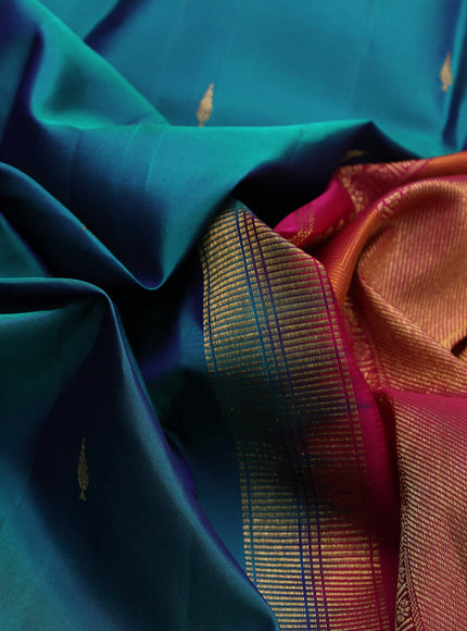 Pure kanchipuram silk saree dual shade of peacock green and pink with zari woven buttas and rettapet zari woven korvai border