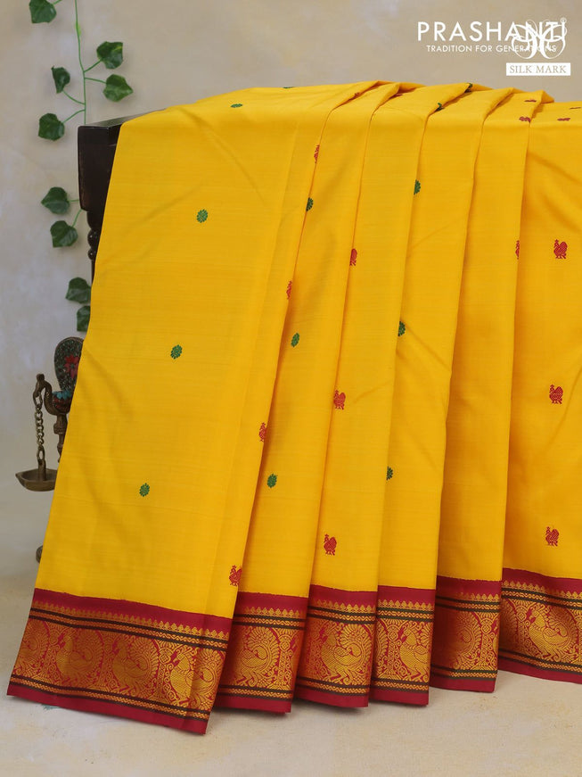 Pure kanchipuram silk saree yellow and maroon with thread woven buttas and annam thread woven korvai border