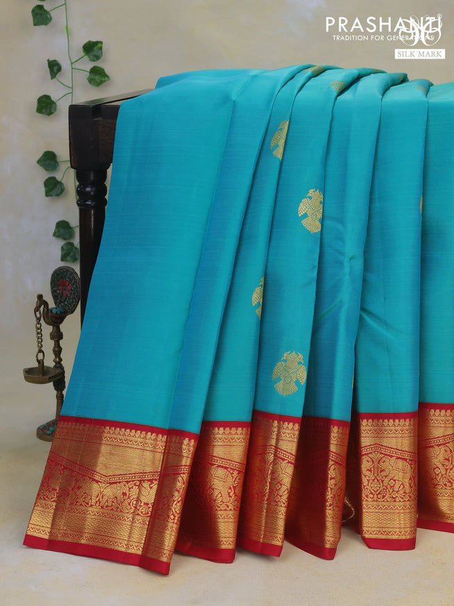 Pure kanchipuram silk saree teal blue and pink with zari woven buttas and rich zari woven korvai border