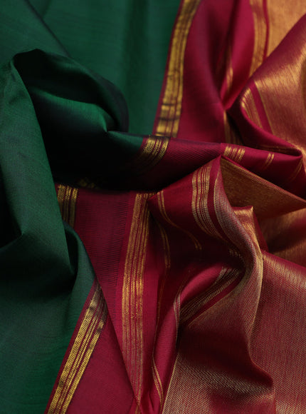 Pure kanchipuram silk saree dark green and maroon with plain body and temple design zari checked border