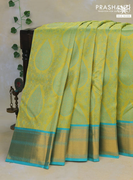 Pure kanchipuram tissue silk saree lime green and teal blue with allover zari brocade weaves and zari woven border