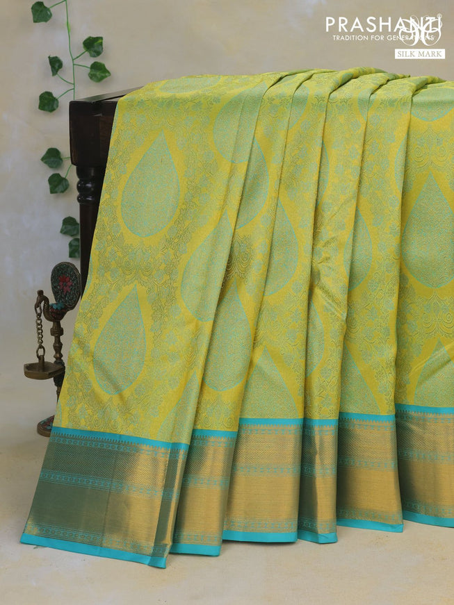 Pure kanchipuram tissue silk saree lime green and teal blue with allover zari brocade weaves and zari woven border