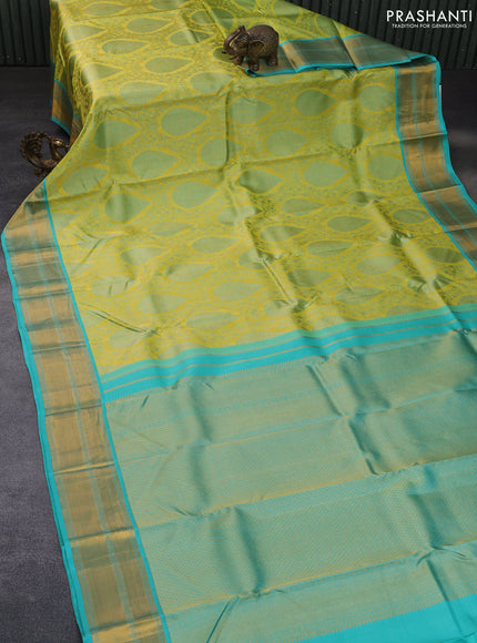 Pure kanchipuram tissue silk saree lime green and teal blue with allover zari brocade weaves and zari woven border