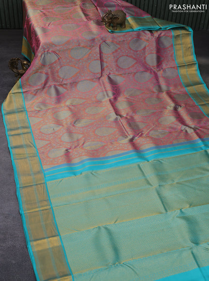 Pure kanchipuram tissue silk saree pastel pink and teal blue with allover zari brocade weaves and zari woven border