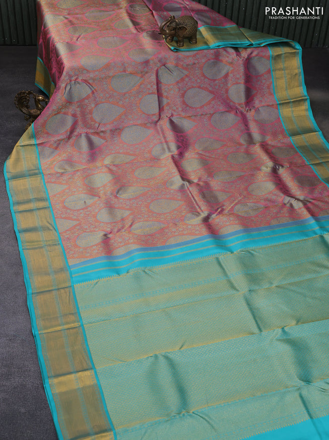 Pure kanchipuram tissue silk saree pastel pink and teal blue with allover zari brocade weaves and zari woven border