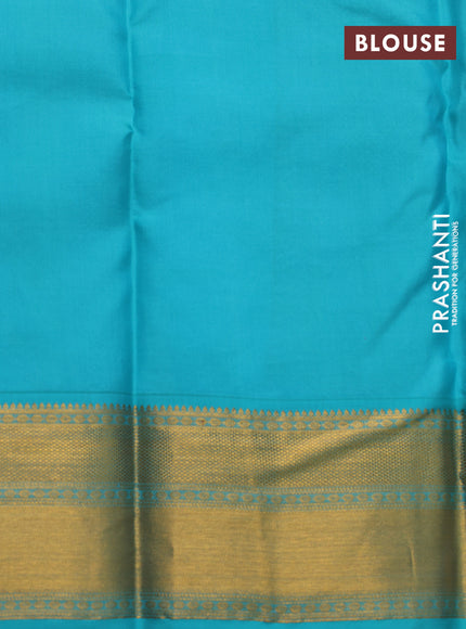 Pure kanchipuram tissue silk saree pastel pink and teal blue with allover zari brocade weaves and zari woven border