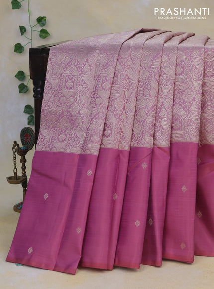 Pure kanchipuram silk saree mauve pink with allover silver zari woven brocade weaves and long silver zari woven butta border