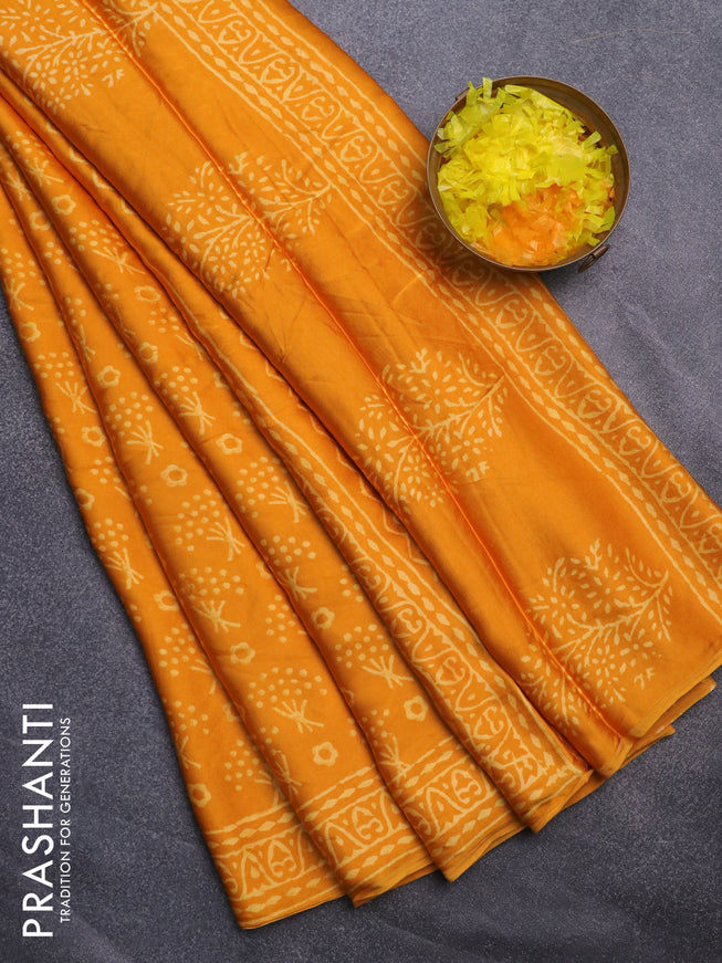 Modal silk saree mango yellow with allover prints and printed border