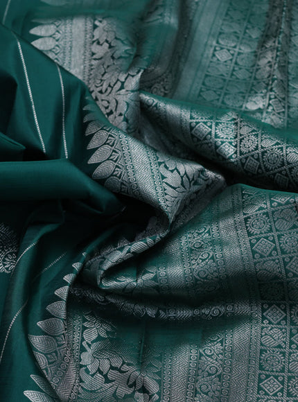 Pure kanchipuram silk saree green and wine shade with allover silver zari woven paisley buttas in borderless style