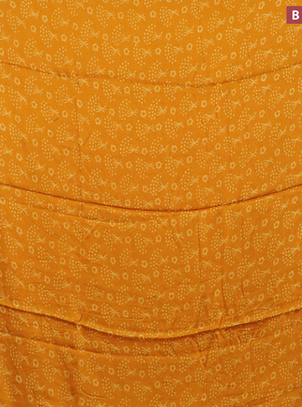 Modal silk saree mango yellow with allover prints and printed border