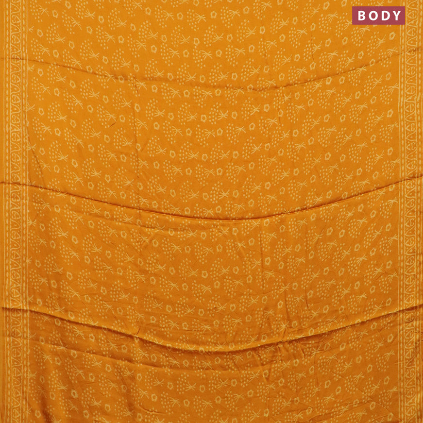 Modal silk saree mango yellow with allover prints and printed border