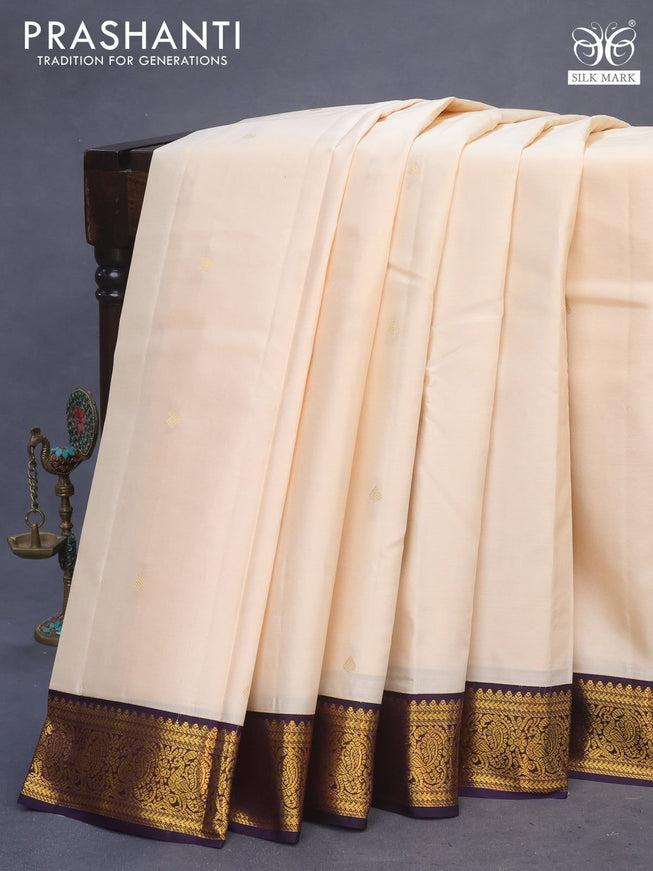 Pure kanchipuram silk saree cream and deep violet with zari woven buttas and zari woven korvai border