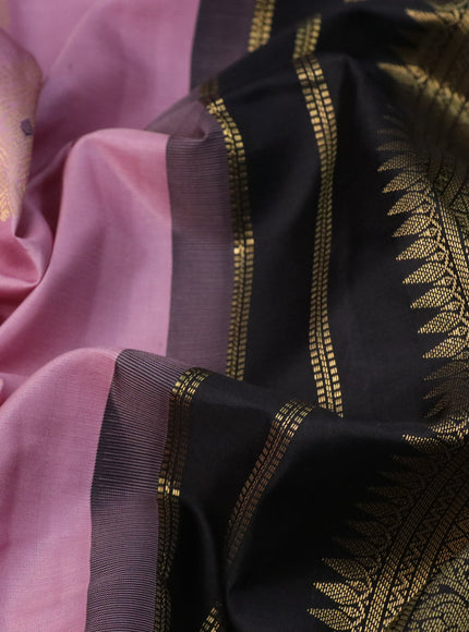 Pure kanchipuram silk saree pastel pink and black with zari woven buttas and zari woven korvai border