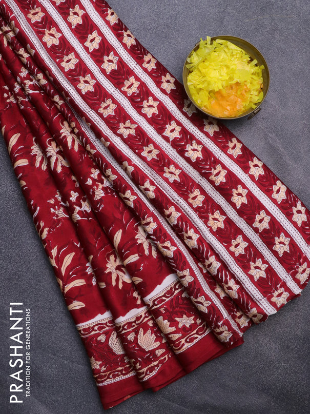 Modal silk saree red with allover floral prints and printed border